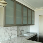 Custom grey metal- Detailed - kitchen doors with frosted glass centers