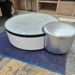 Custom blackened steel metal ring on this white lacquer - Cracked glass & Upholstered stool - Coffee table